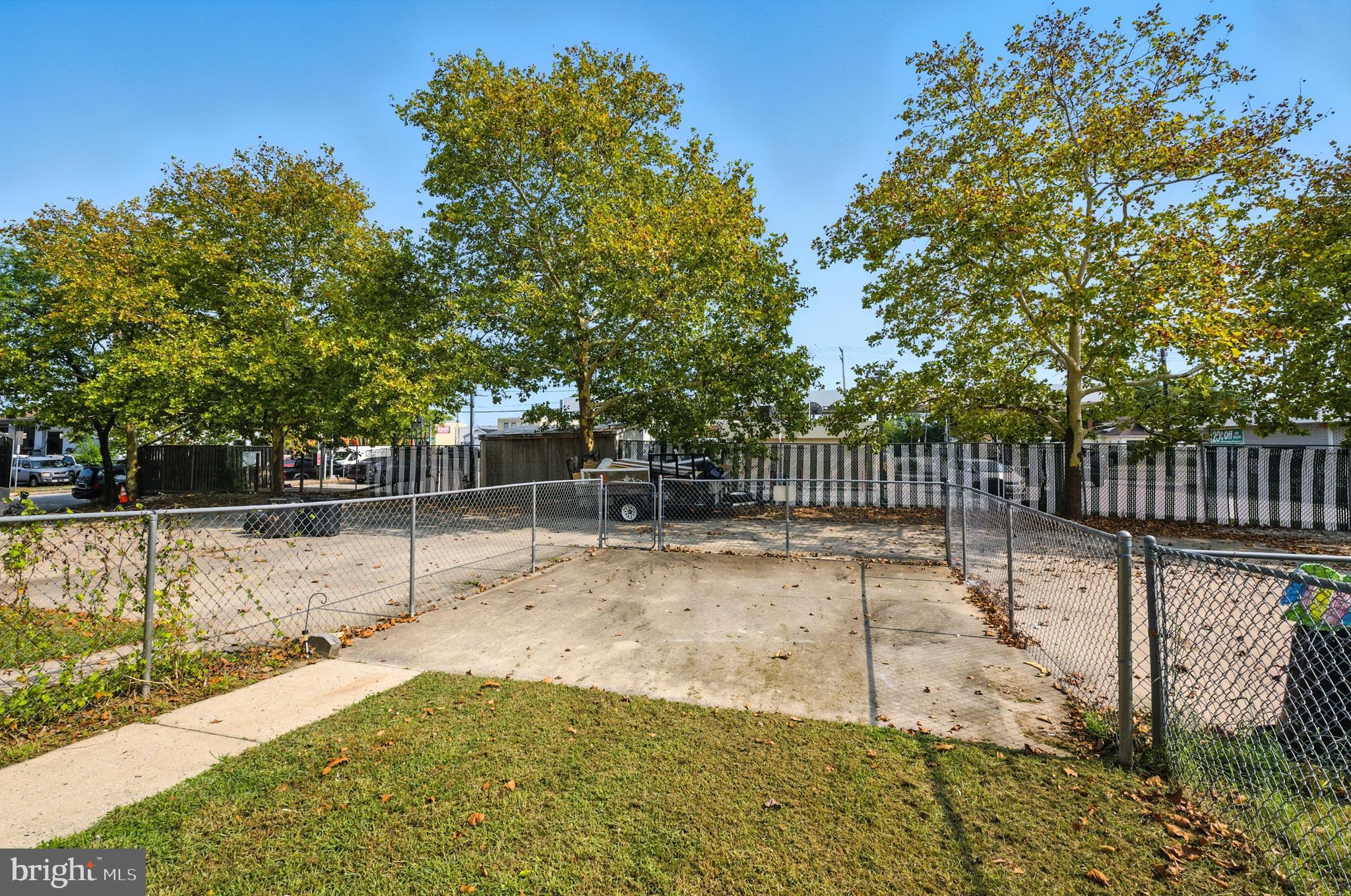 209 Magnolia Terrace Baltimore, MD 21221 - Photo 41 of 50 a view of a backyard with fence