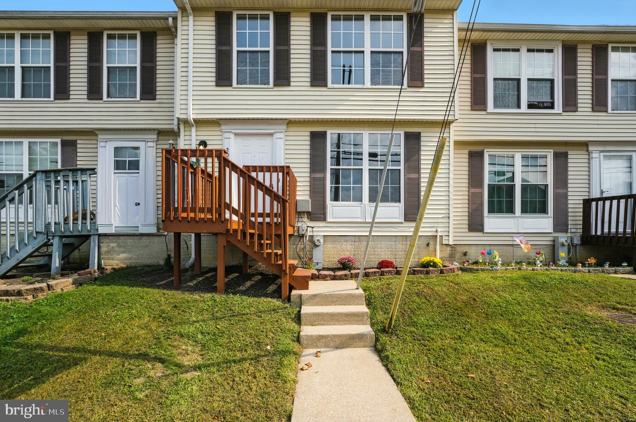 209 Magnolia Terrace Baltimore, MD 21221 - Photo 44 of 50 front view of a house with a yard