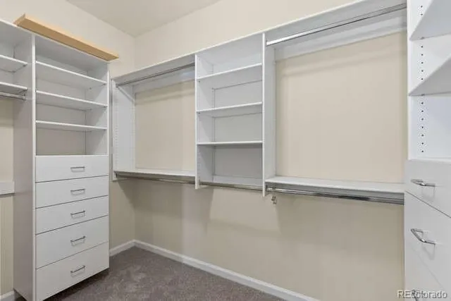 a view of an empty walk in closet