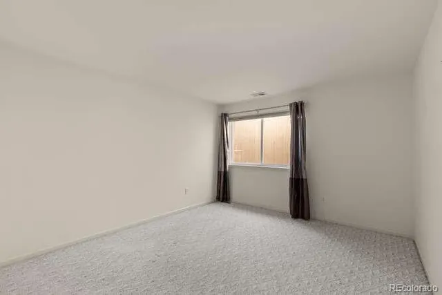 a view of entryway with a front door