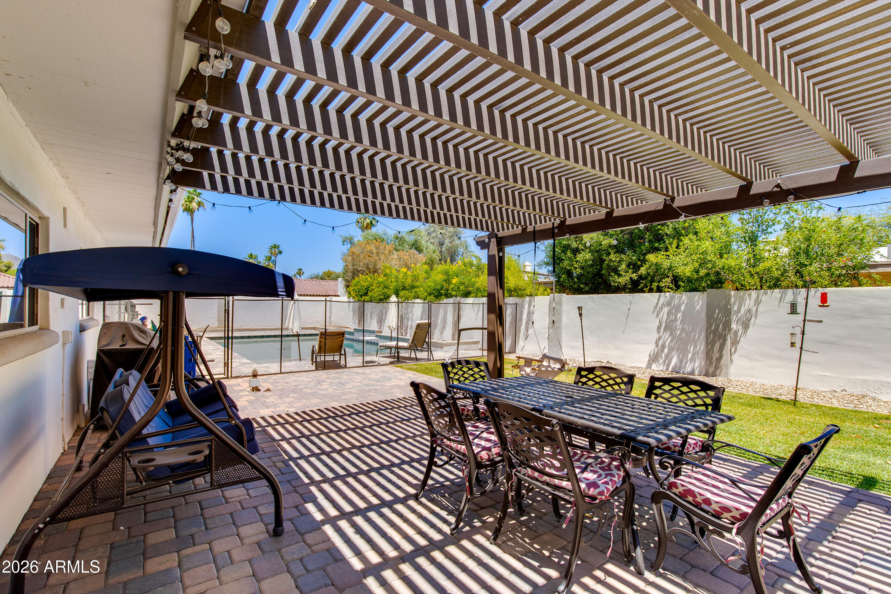8219 North 3rd Avenue Phoenix, AZ 85021 - Photo 41 of 52 an outdoor space with patio and white umbrellas