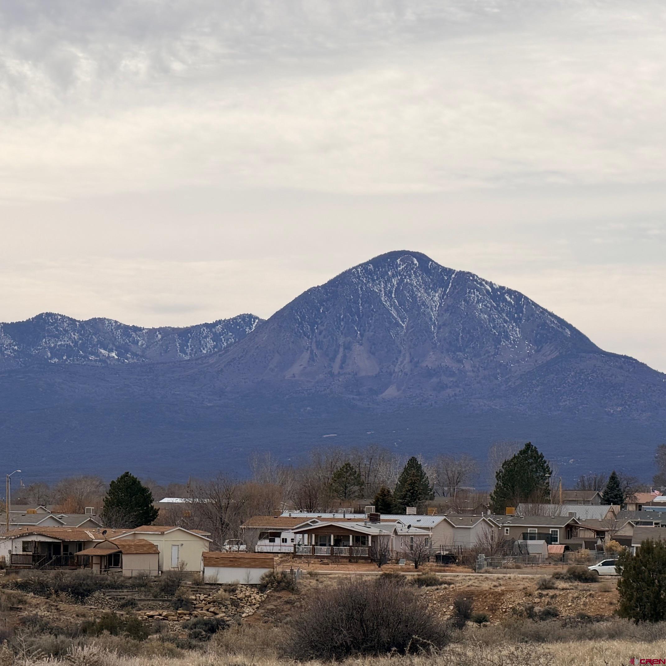 Lot 129 Nicholette Way Cortez, CO 81321 - Photo 14 of 30 a view of a lake with a mountain in the background