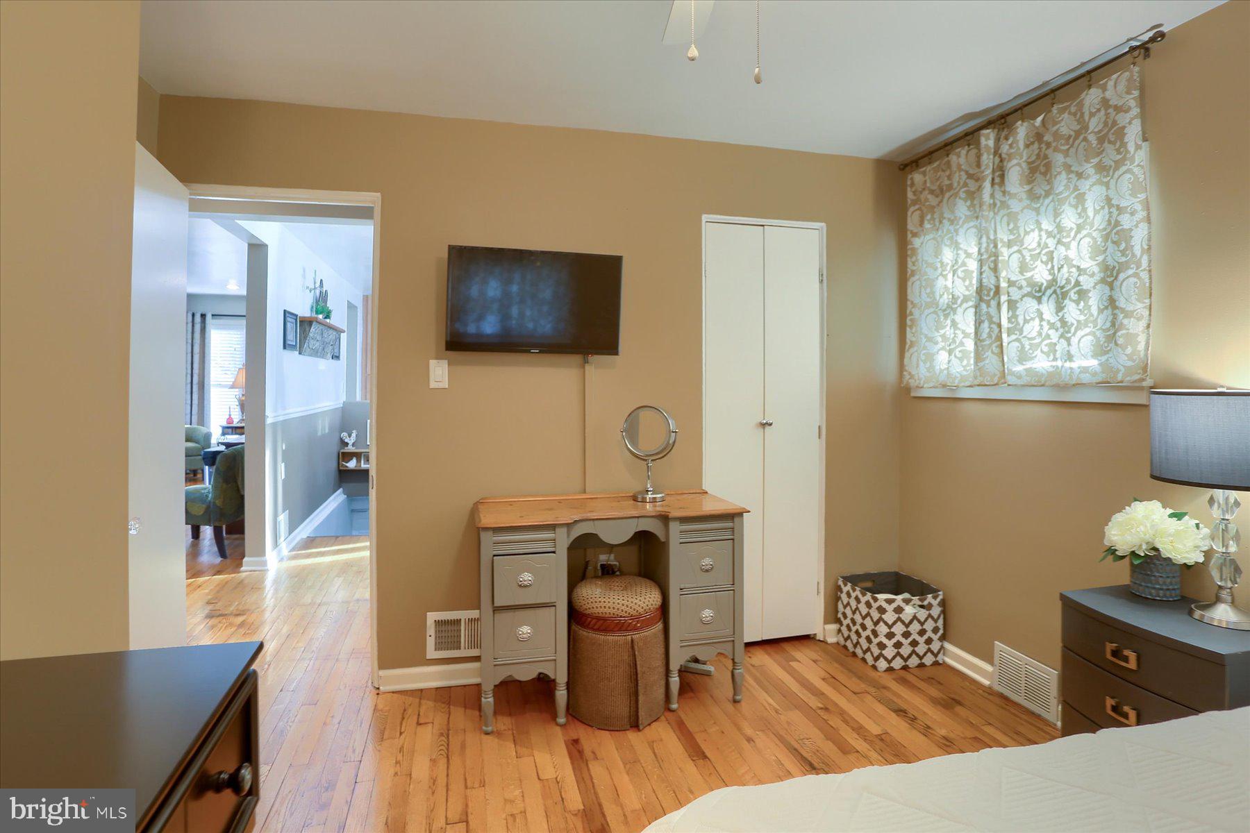 1181 Kingsley Road Camp Hill, PA 17011 - Photo 25 of 40 a living room with furniture and a flat screen tv