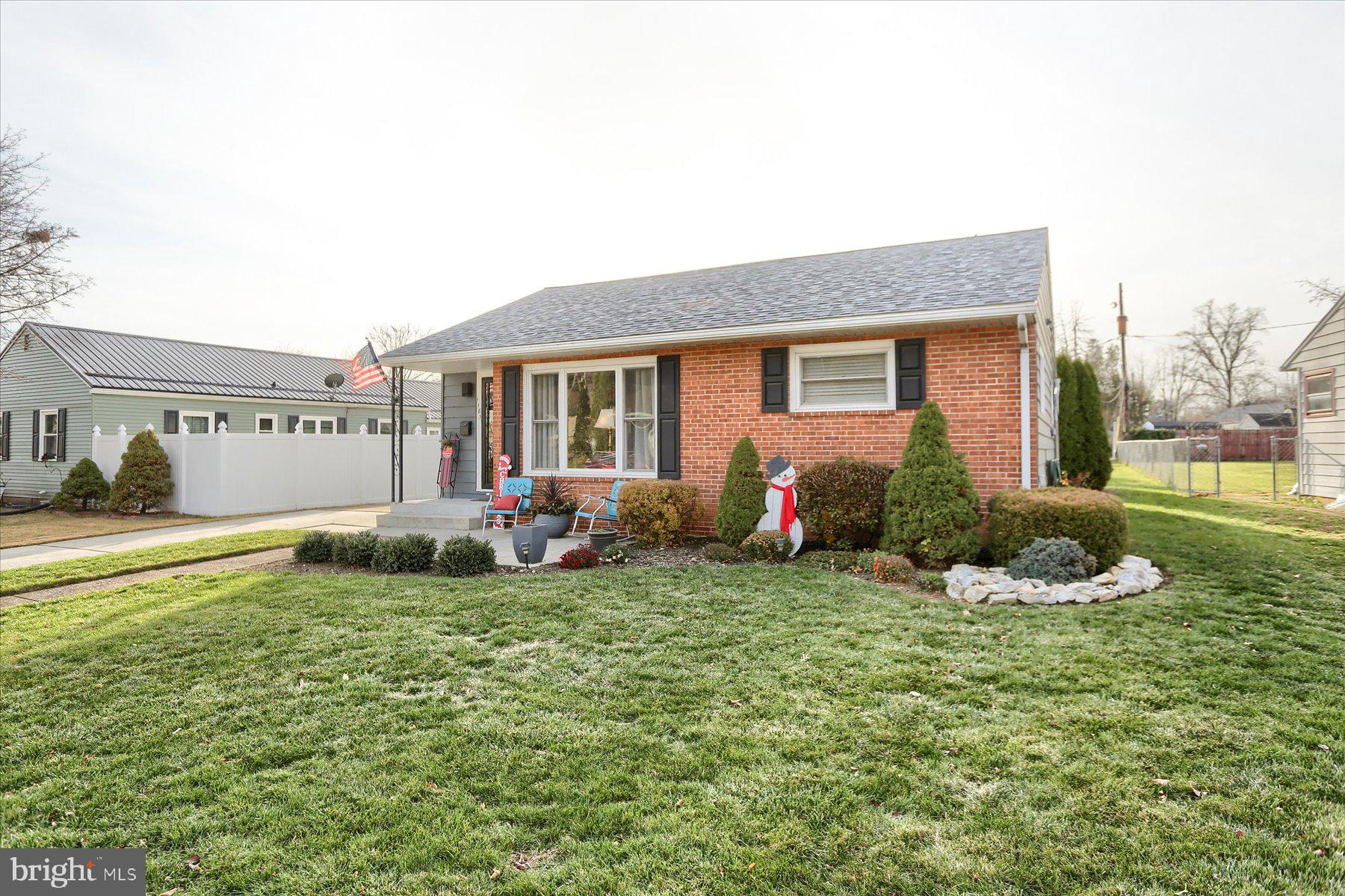 1181 Kingsley Road Camp Hill, PA 17011 - Photo 3 of 40 a view of a house with a big yard and potted plants