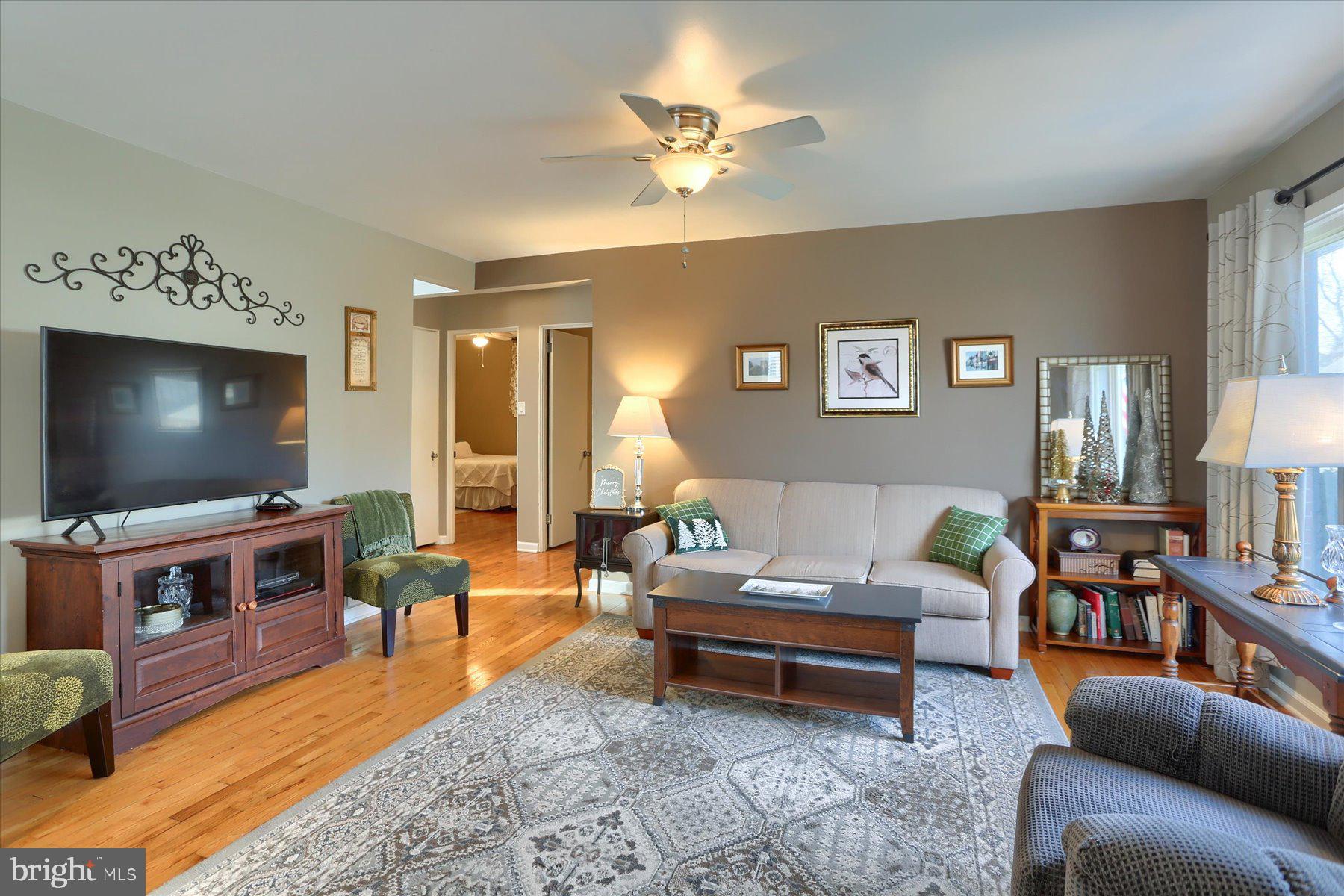 1181 Kingsley Road Camp Hill, PA 17011 - Photo 6 of 40 a living room with furniture and a flat screen tv