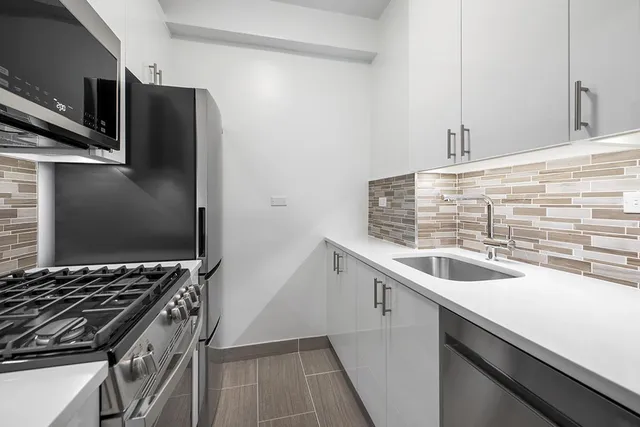 a picture of a park with a bench