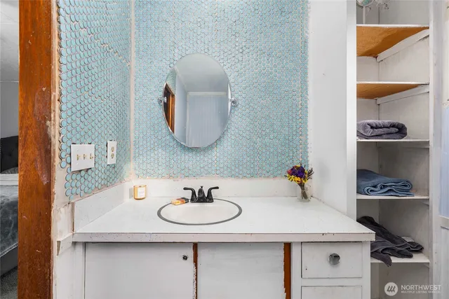 a living room with lots of furniture and a flat screen tv