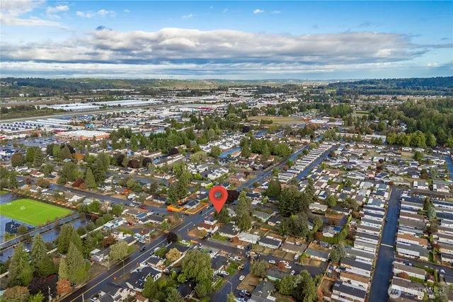 a living room with furniture and window