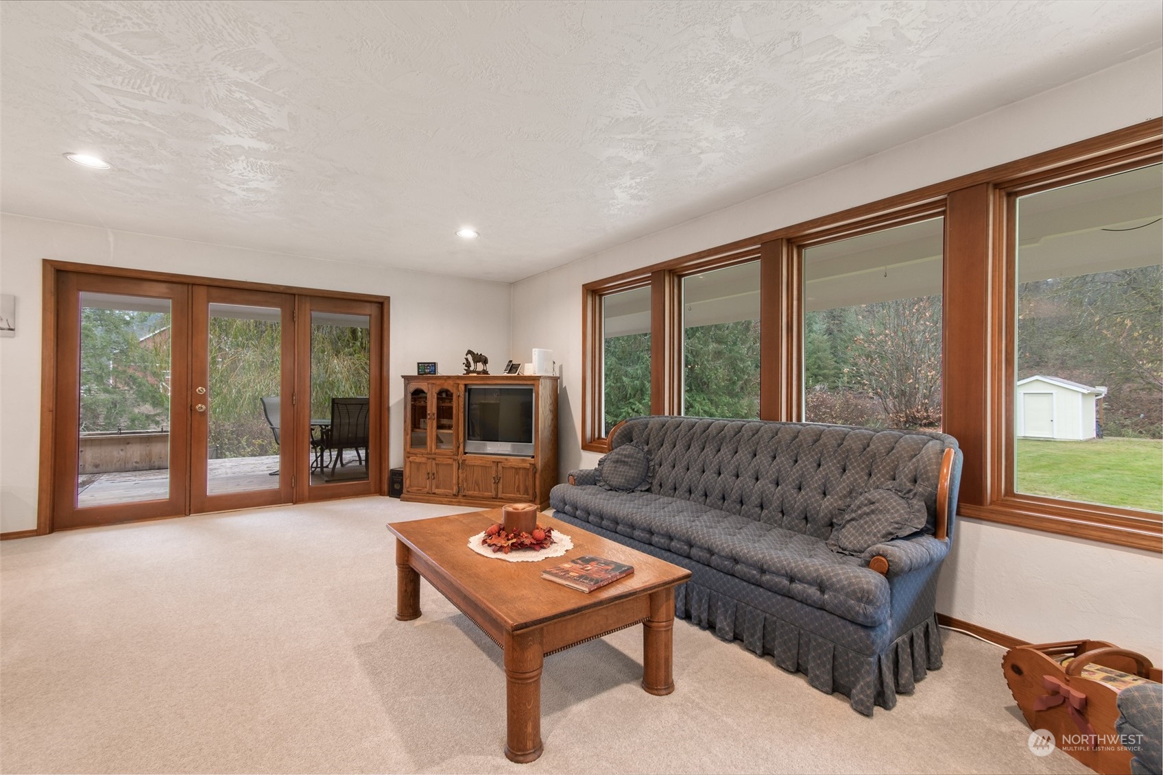 9406 Crete Street Southeast Olympia, WA 98501 - Photo 15 of 38 a living room with furniture and a large window