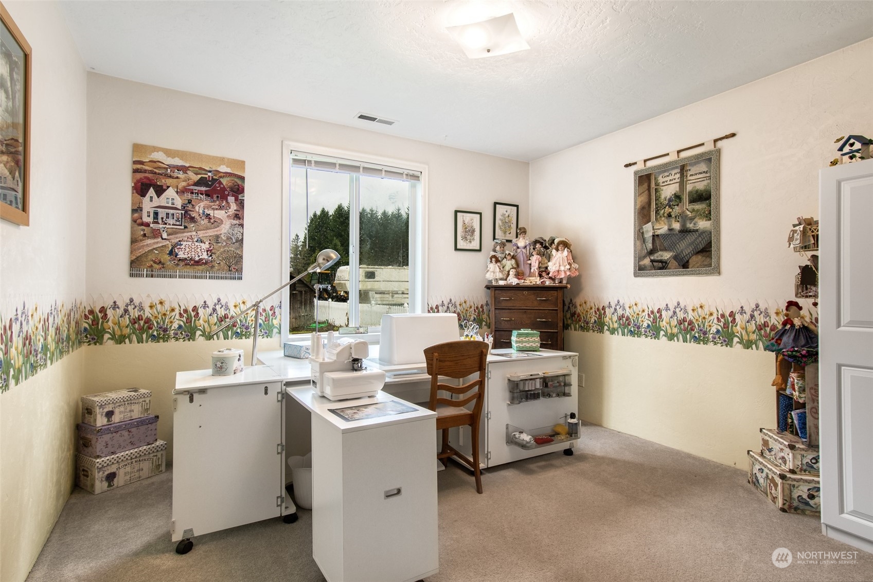 9406 Crete Street Southeast Olympia, WA 98501 - Photo 30 of 38 a view of a workspace with furniture and a window
