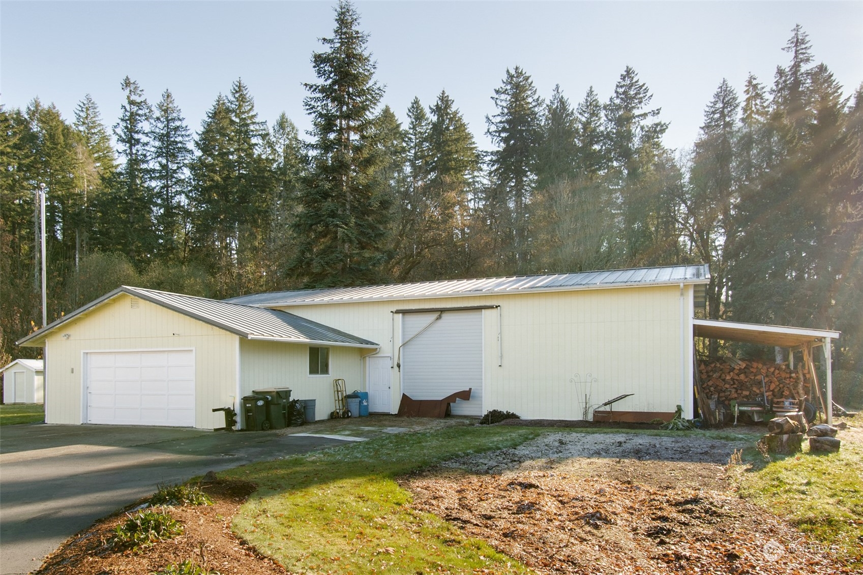 9406 Crete Street Southeast Olympia, WA 98501 - Photo 35 of 38 a view of a house with backyard and trees