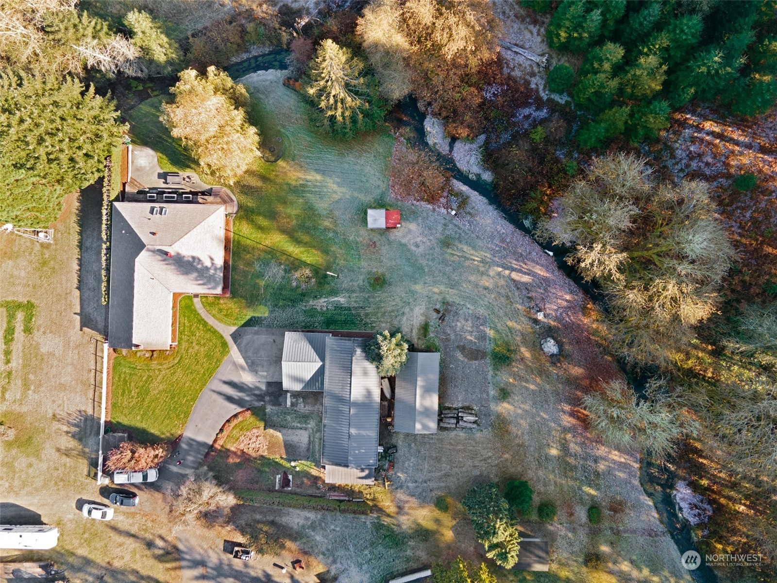 9406 Crete Street Southeast Olympia, WA 98501 - Photo 36 of 38 an aerial view of house with yard swimming pool and outdoor seating