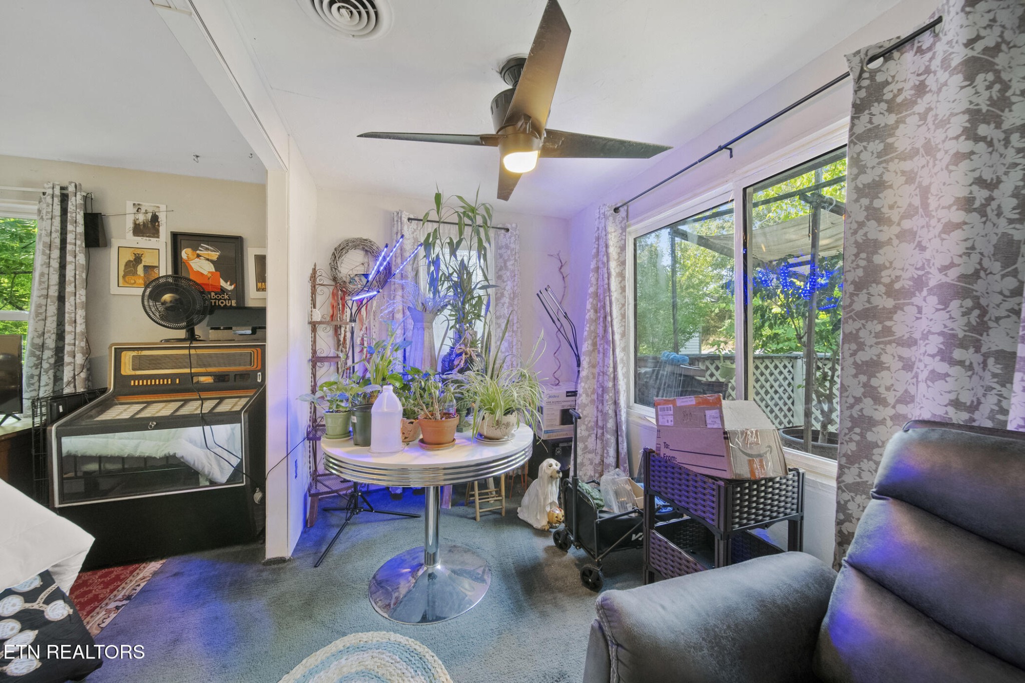 4880 Shell Lane Knoxville, TN 37918 - Photo 14 of 37 a living room with patio furniture and a floor to ceiling window