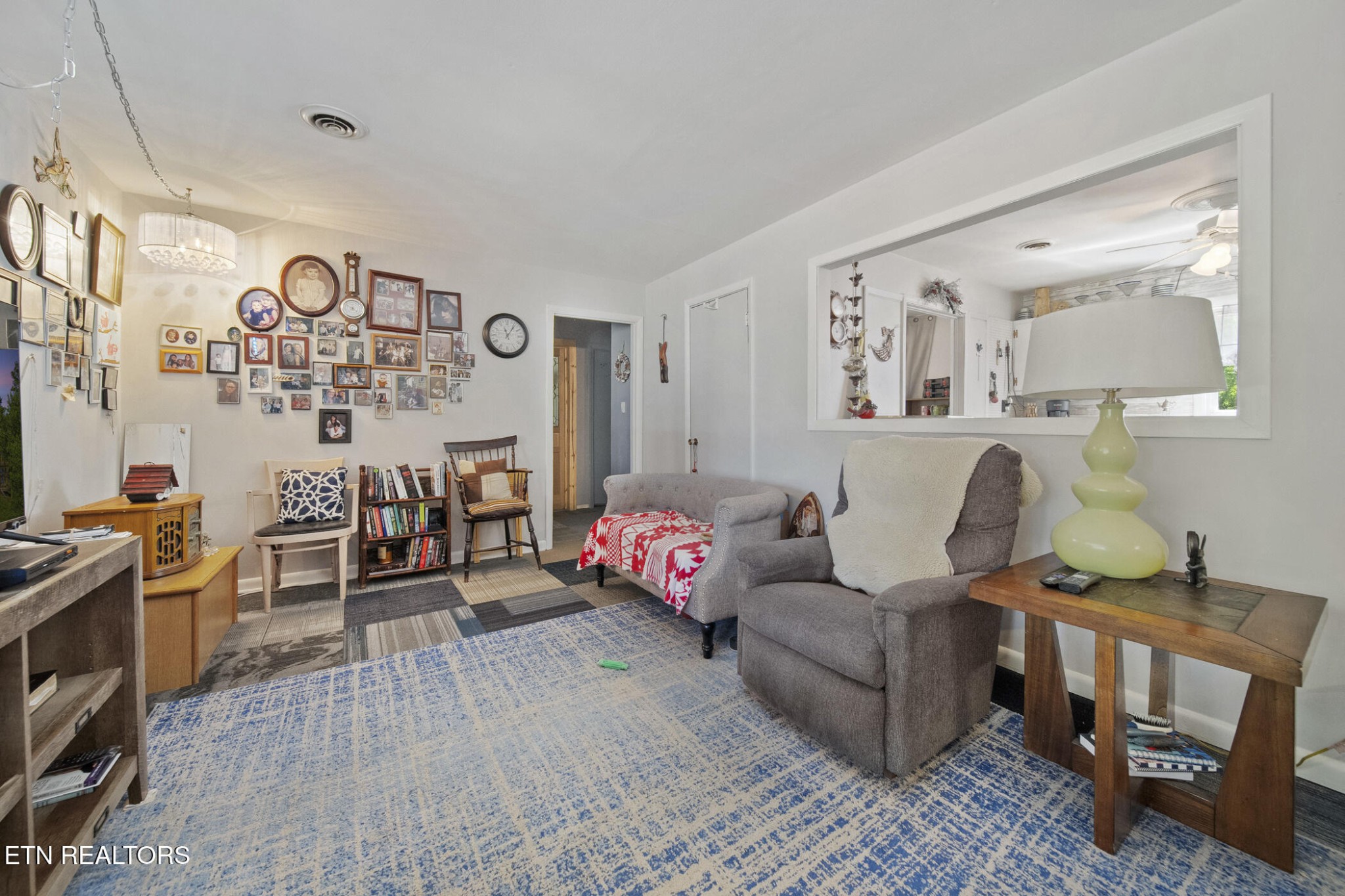 4880 Shell Lane Knoxville, TN 37918 - Photo 22 of 37 a living room with furniture and a flat screen tv