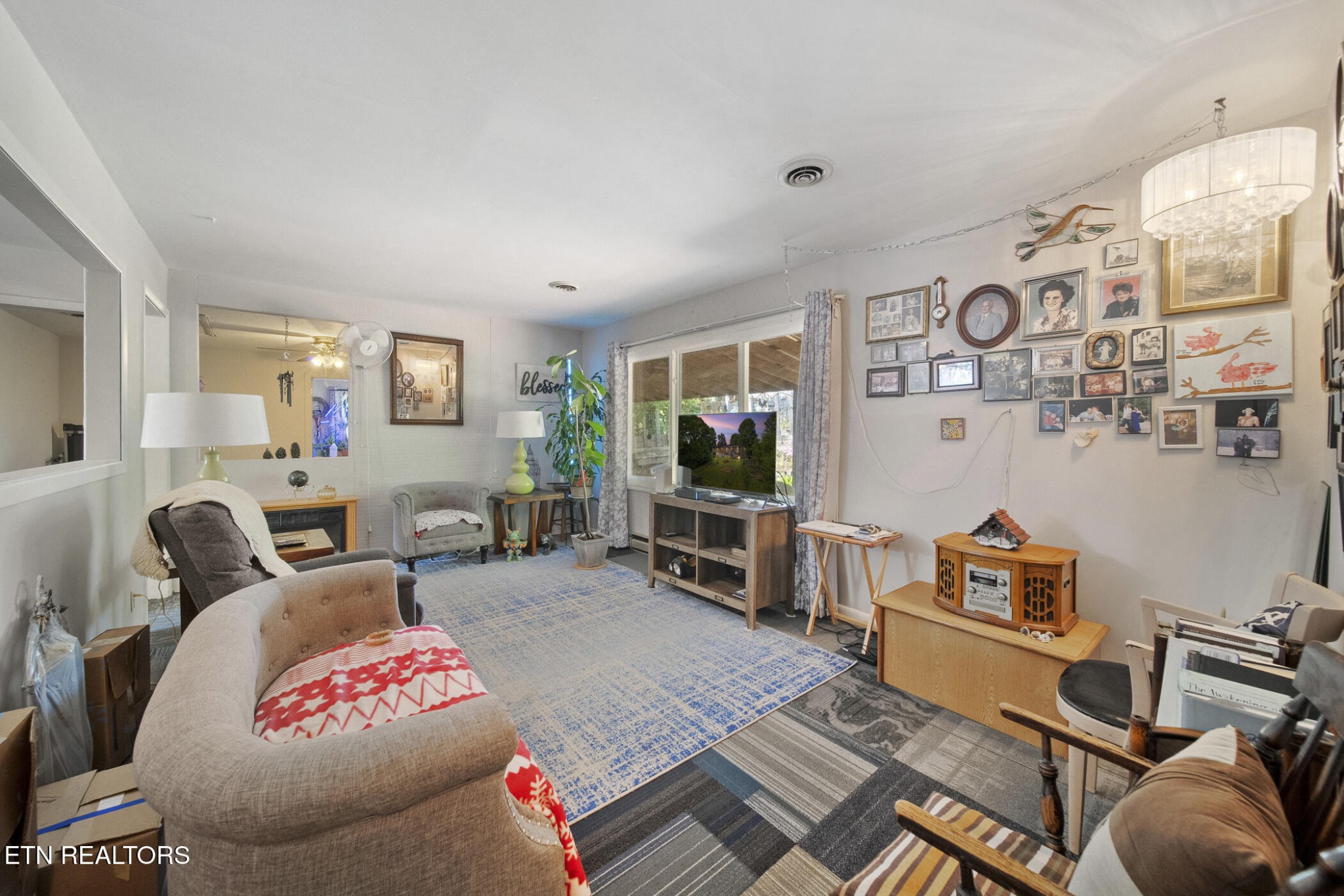 4880 Shell Lane Knoxville, TN 37918 - Photo 23 of 37 a living room with furniture and a flat screen tv