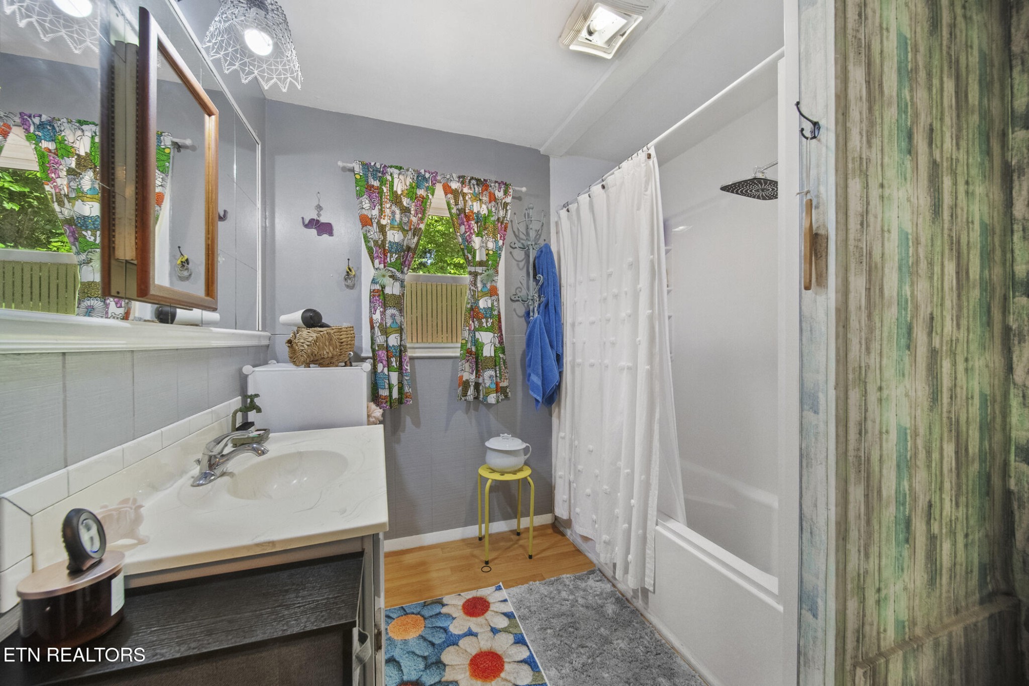 4880 Shell Lane Knoxville, TN 37918 - Photo 24 of 37 a bathroom with a sink and a mirror