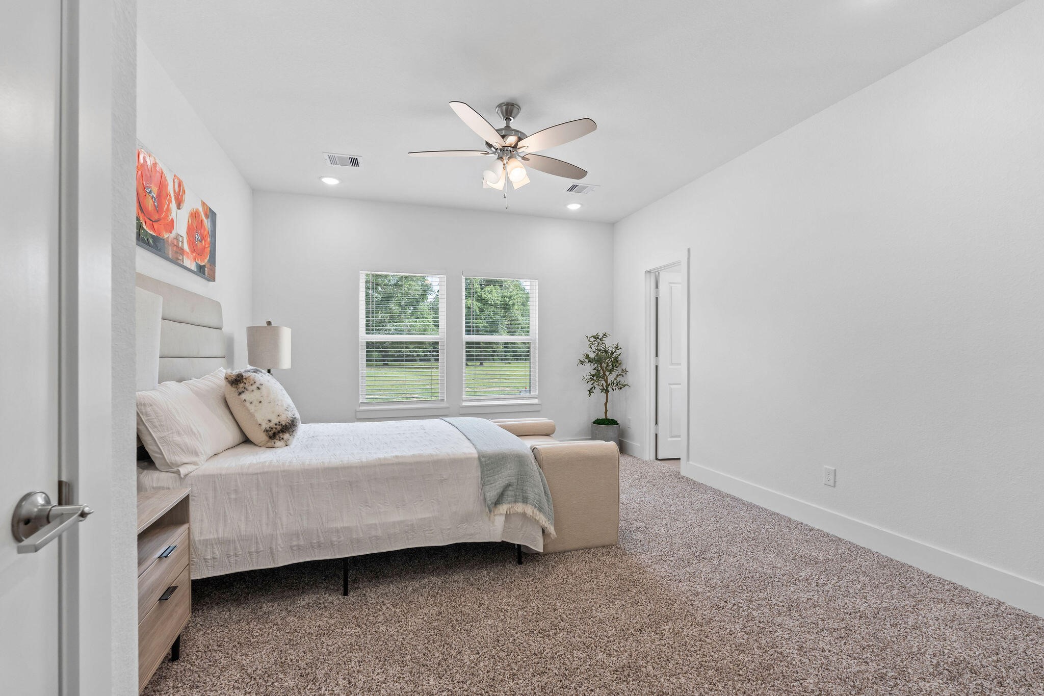 39645 Bosque Road Hempstead, TX 77445 - Photo 15 of 37 a bedroom with a bed and a window