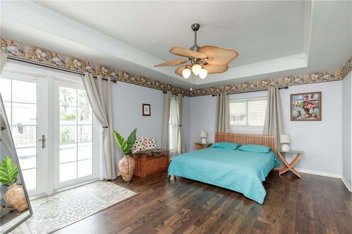 15833 Cuttysark Street Corpus Christi, TX 78418 - Photo 14 of 32 a view of a room with a window and wooden floor