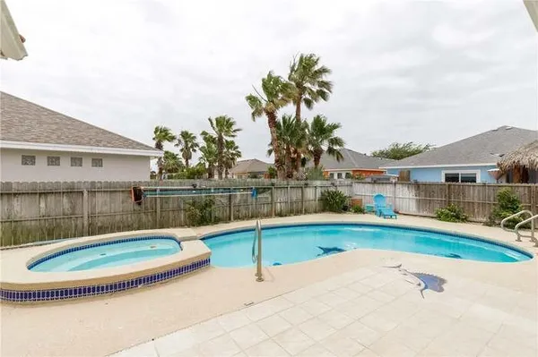 a view of a house with a swimming pool