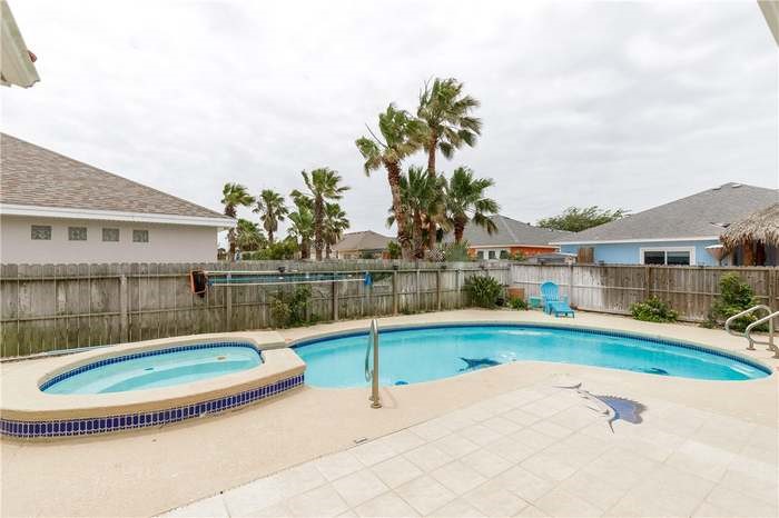 15833 Cuttysark Street Corpus Christi, TX 78418 - Photo 24 of 32 a view of a house with a swimming pool