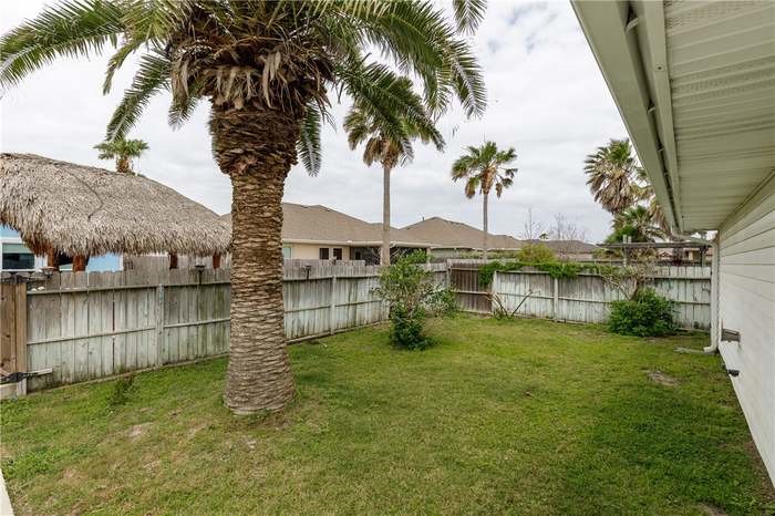 15833 Cuttysark Street Corpus Christi, TX 78418 - Photo 30 of 32 a garden with trees
