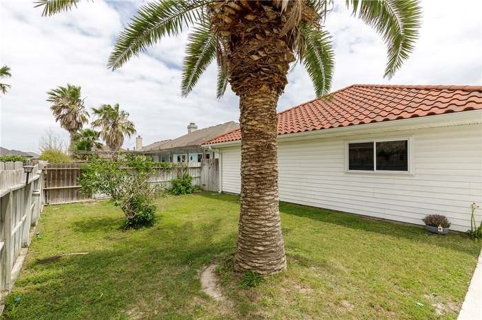 15833 Cuttysark Street Corpus Christi, TX 78418 - Photo 31 of 32 a view of a house with a yard