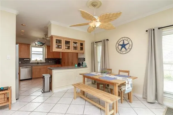 a living room with granite countertop furniture and a large window