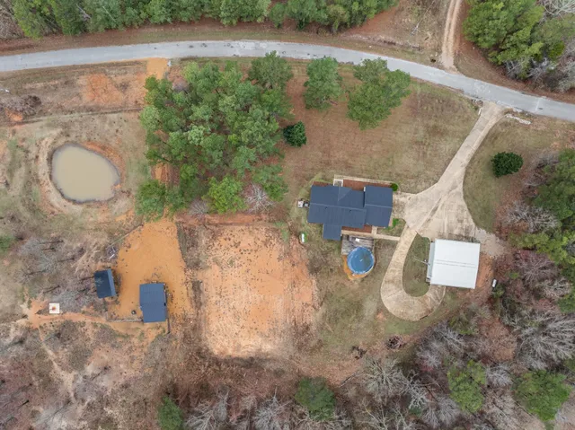 a view of a street with a yard