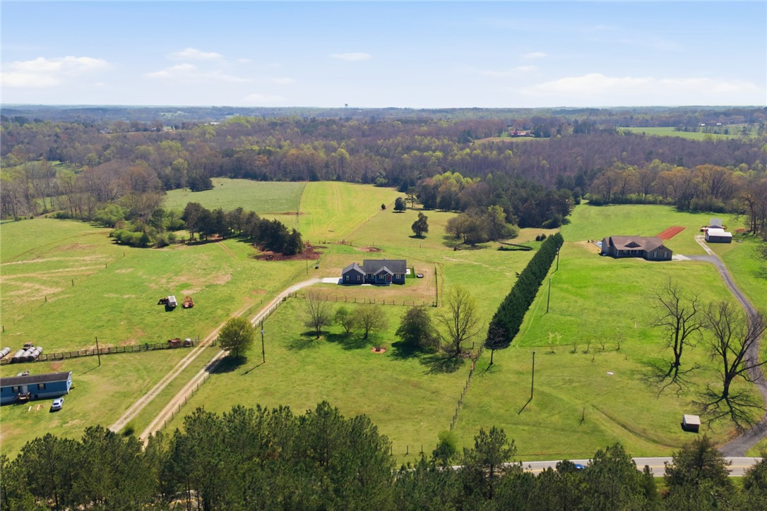 426 Oak Creek Road Seneca, SC 29678 - Photo 47 of 50 Expansive green acreage with multiple residences and vast outdoor space.