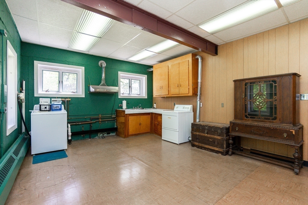 152 Stowell Road Ashburnham, MA 01430 - Photo 16 of 38 a kitchen that has a sink and a microwave oven in it