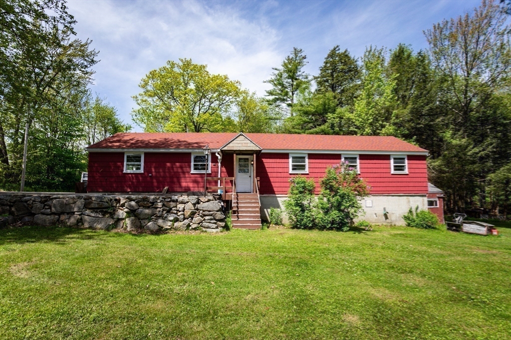 152 Stowell Road Ashburnham, MA 01430 - Photo 24 of 38 a front view of a house with garden
