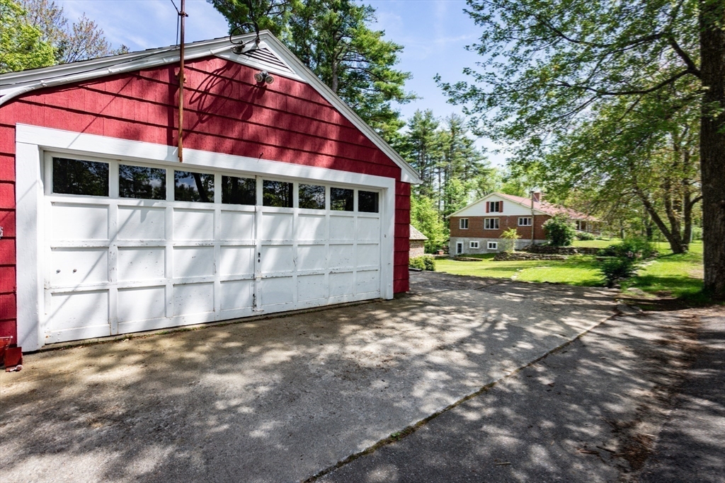 152 Stowell Road Ashburnham, MA 01430 - Photo 25 of 38 a view of a house with a yard