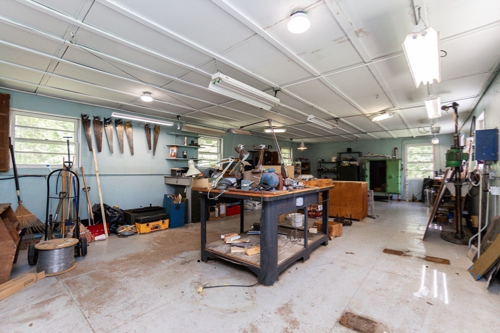 152 Stowell Road Ashburnham, MA 01430 - Photo 26 of 38 a room with lots of furniture and clutter