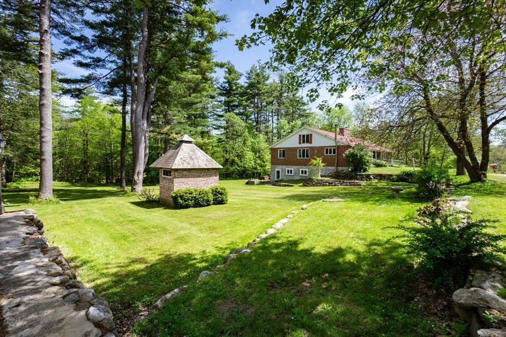 152 Stowell Road Ashburnham, MA 01430 - Photo 29 of 38 a view of a house with swimming pool and sitting area