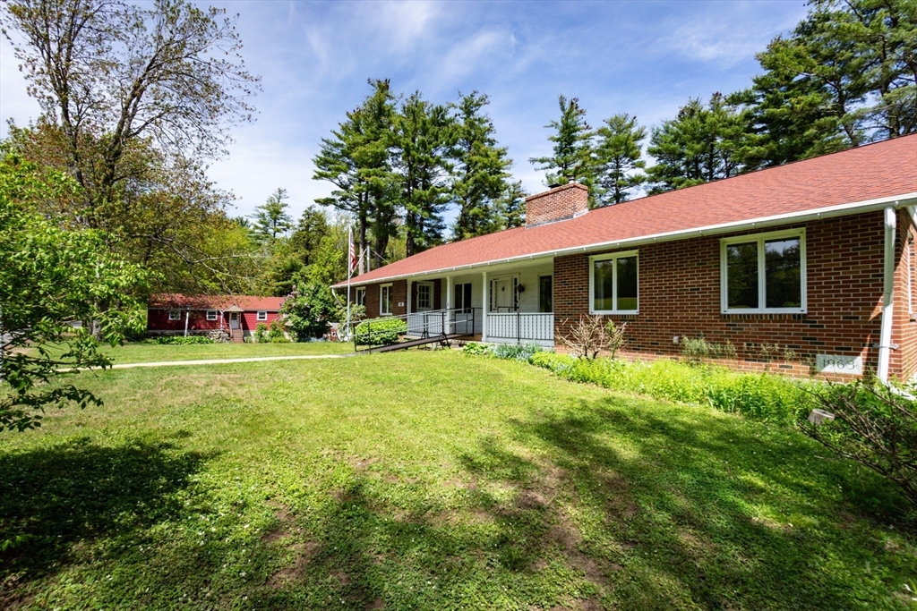 152 Stowell Road Ashburnham, MA 01430 - Photo 33 of 38 a front view of house with yard and green space