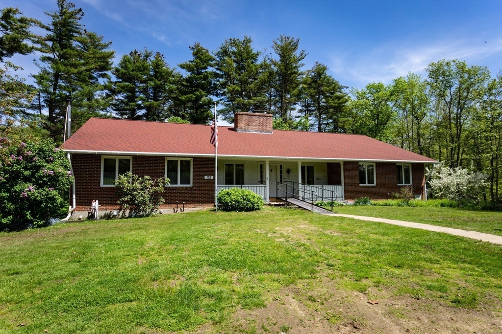 152 Stowell Road Ashburnham, MA 01430 - Photo 34 of 38 a view of a house with a yard porch and sitting area