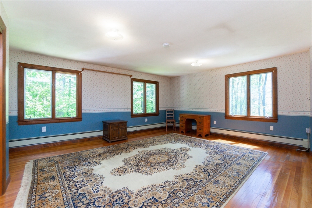 152 Stowell Road Ashburnham, MA 01430 - Photo 10 of 38 a living room with furniture rug and window