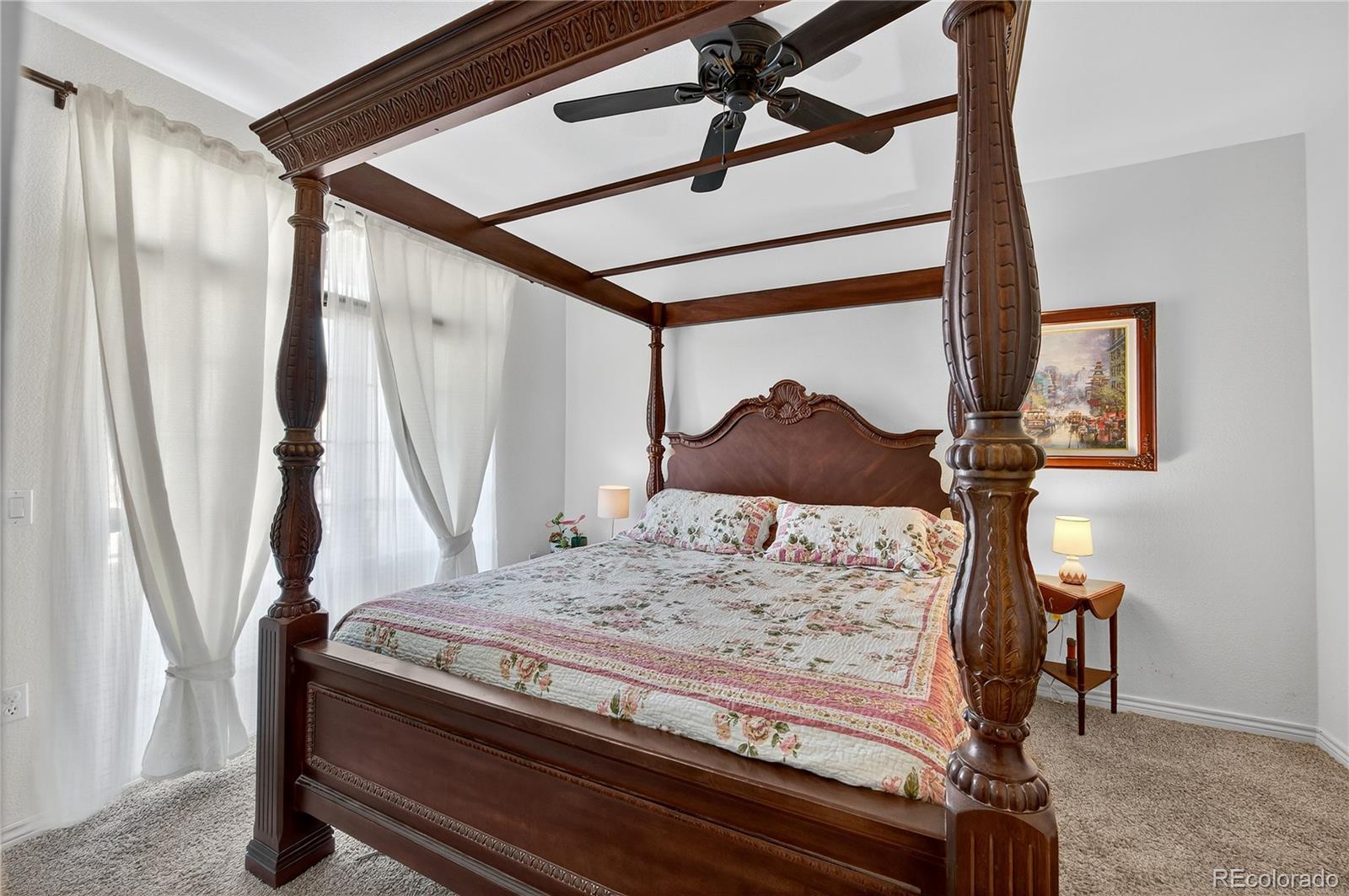 18611 Stroh Road, Unit 5203 Parker, CO 80134 - Photo 11 of 28 a bedroom with a bed and a window