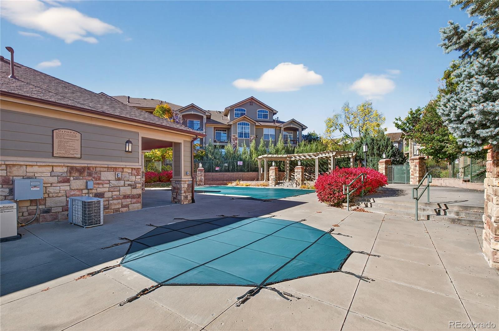 18611 Stroh Road, Unit 5203 Parker, CO 80134 - Photo 19 of 28 a view of a chairs and tables in the patio