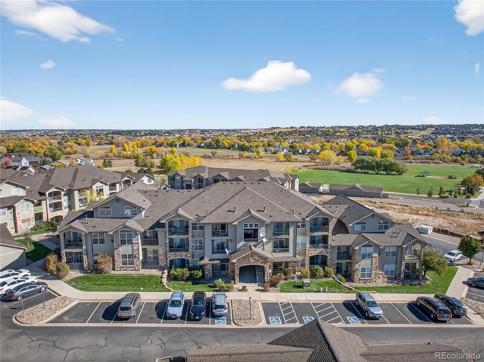 18611 Stroh Road, Unit 5203 Parker, CO 80134 - Photo 25 of 28 a view of multiple houses with a city street