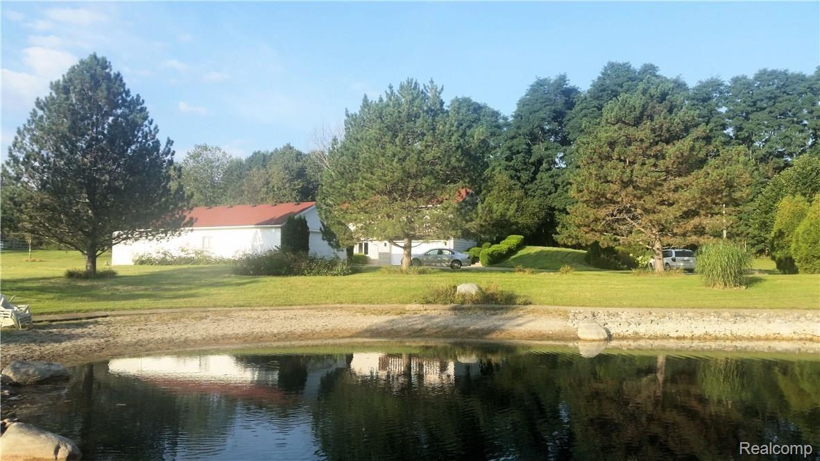 8550 Hough Road Almont, MI 48003 - Photo 9 of 54 new pond with garage.jpg