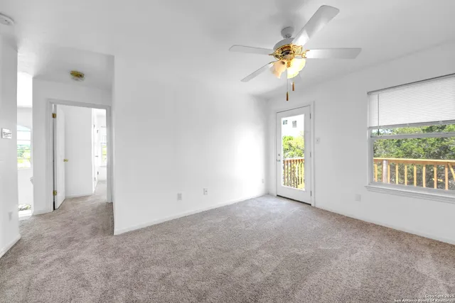 an empty room that has a window