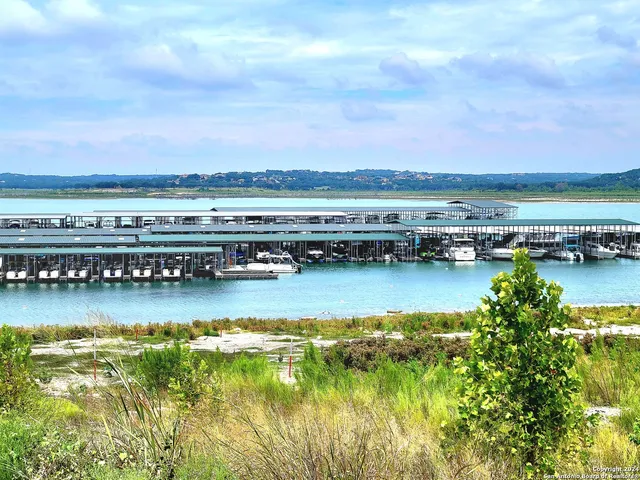 a view of a swimming pool with an ocean view