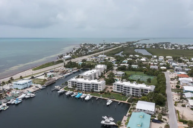 $895,000 | 101 Gulfview Drive, Unit 202 & 30' BOAT SLIP, Islamorada, FL 33036