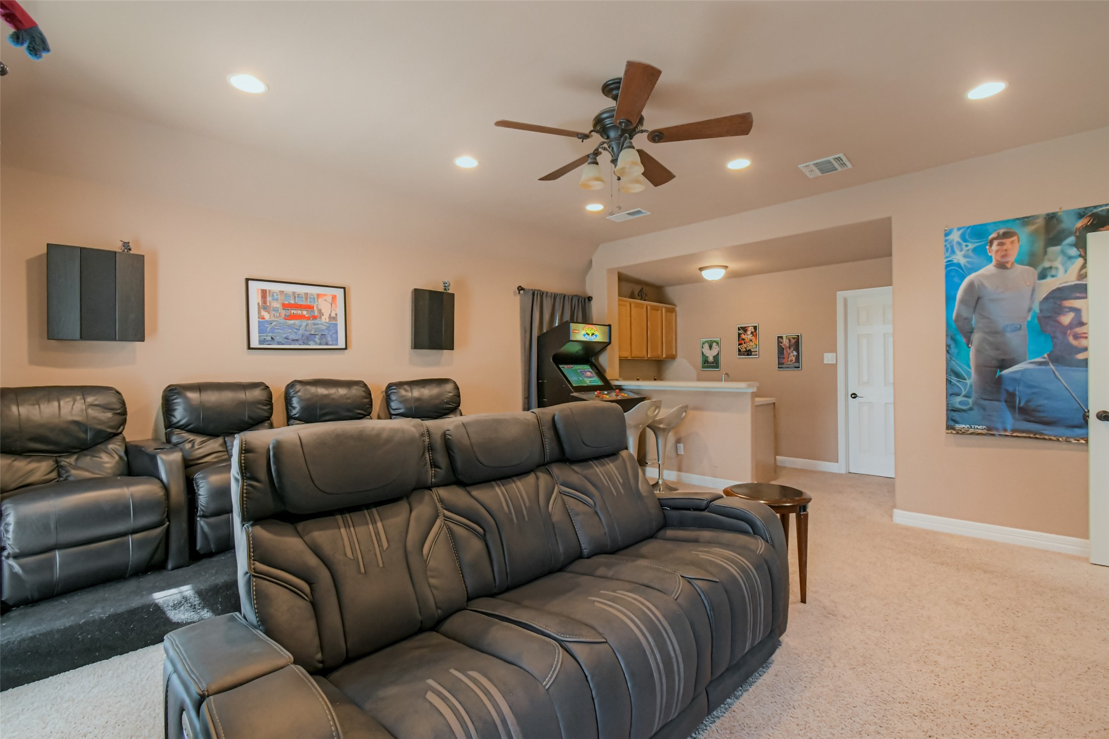 8903 Halder Cove Austin, TX 78717 - Photo 18 of 26 Cinema with ceiling fan, light colored carpet, and recessed lighting
