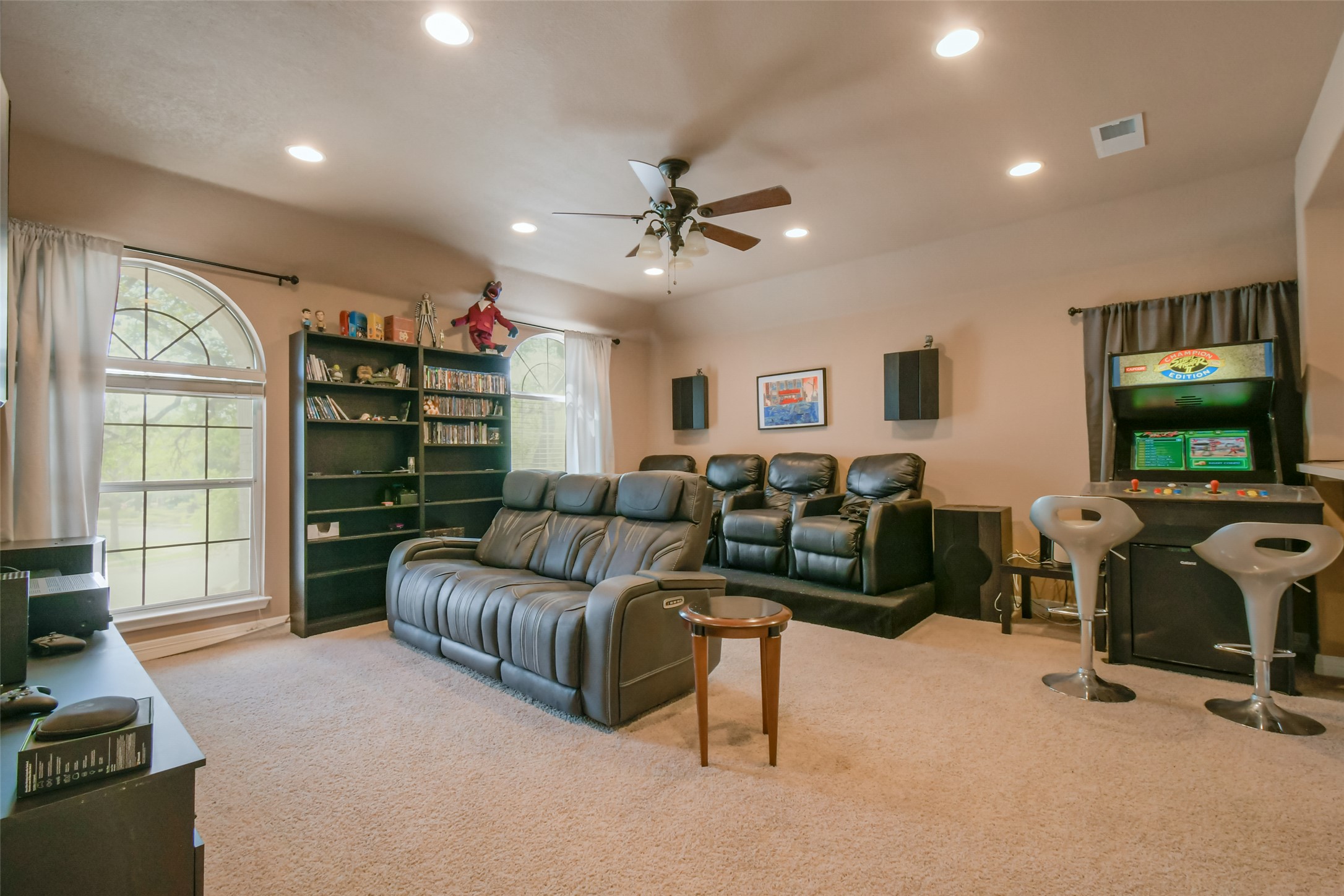 8903 Halder Cove Austin, TX 78717 - Photo 19 of 26 Living room with ceiling fan, light colored carpet, and recessed lighting