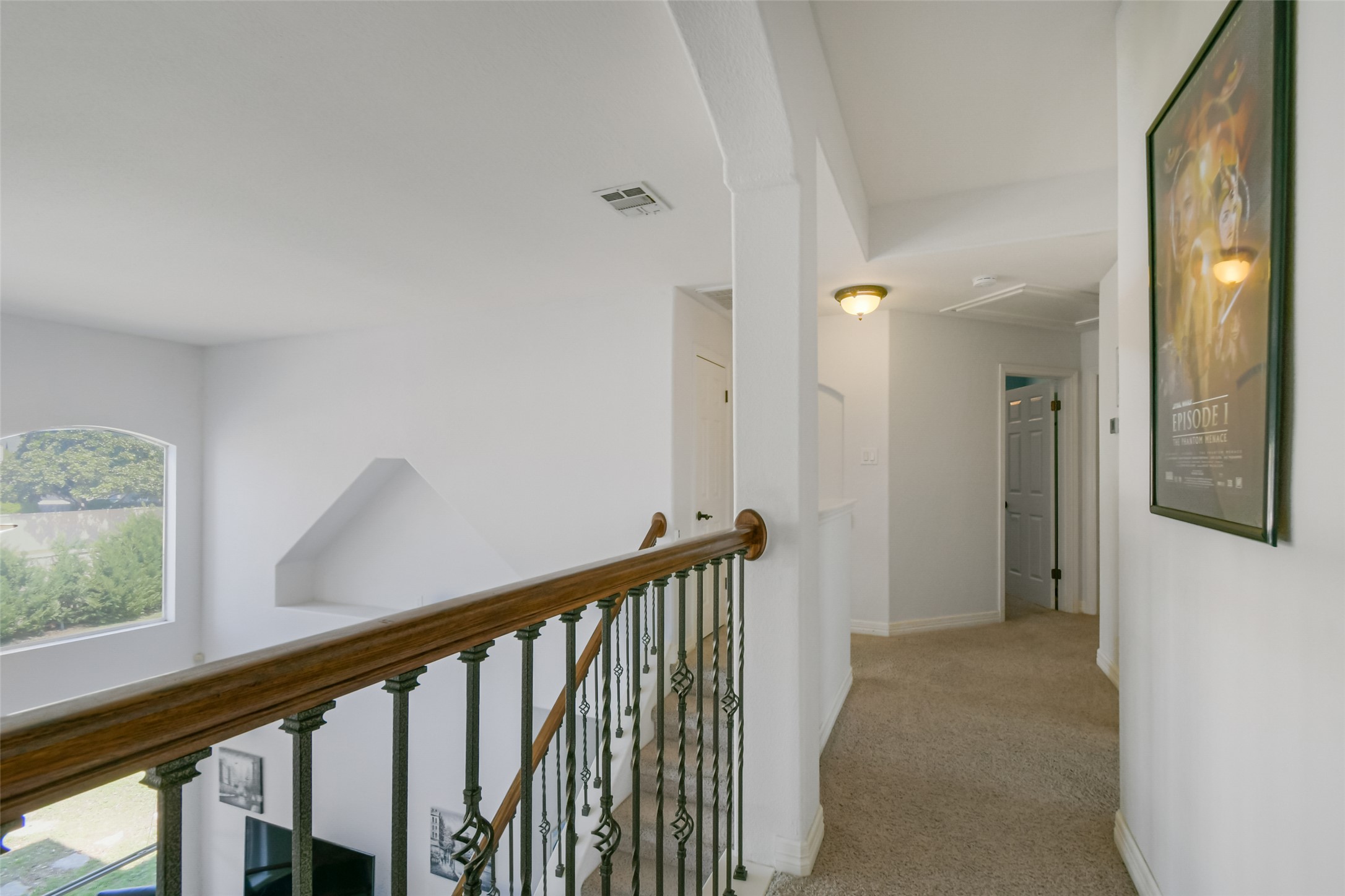 8903 Halder Cove Austin, TX 78717 - Photo 20 of 26 Hall featuring light carpet and an upstairs landing
