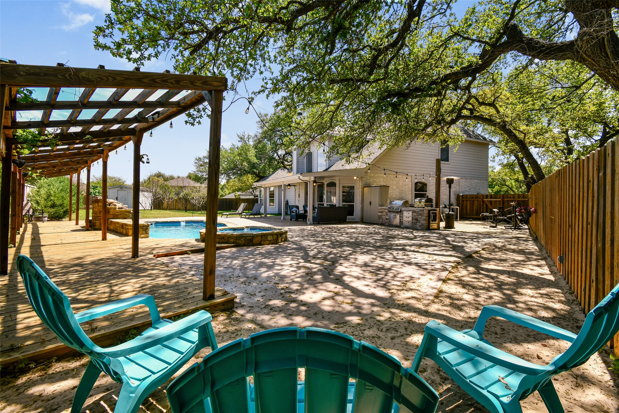 8903 Halder Cove Austin, TX 78717 - Photo 24 of 26 Fenced backyard featuring a patio area and a pergola