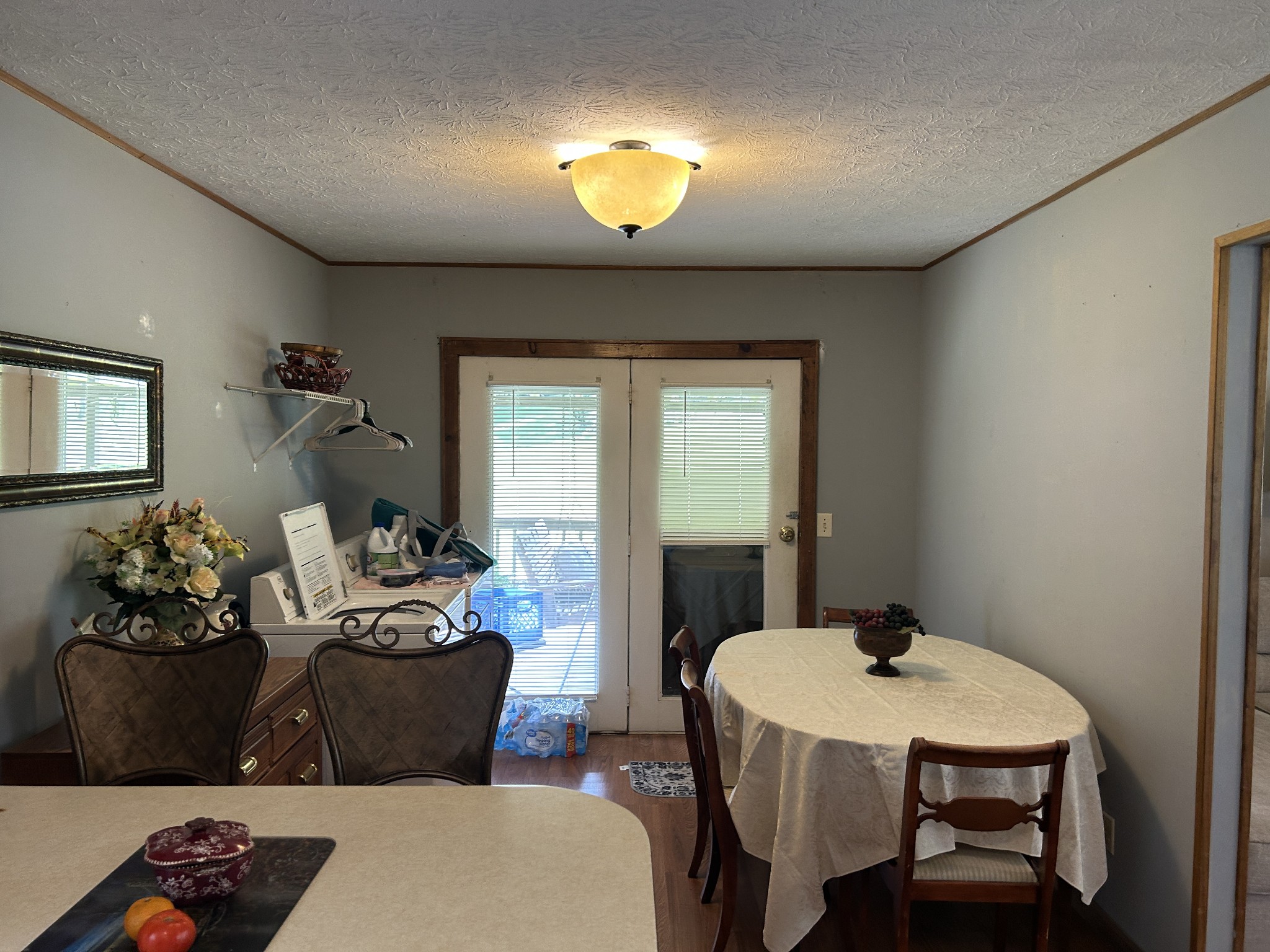 1041 Roysden Road Jamestown, TN 38556 - Photo 12 of 18 a living room with furniture and a chandelier