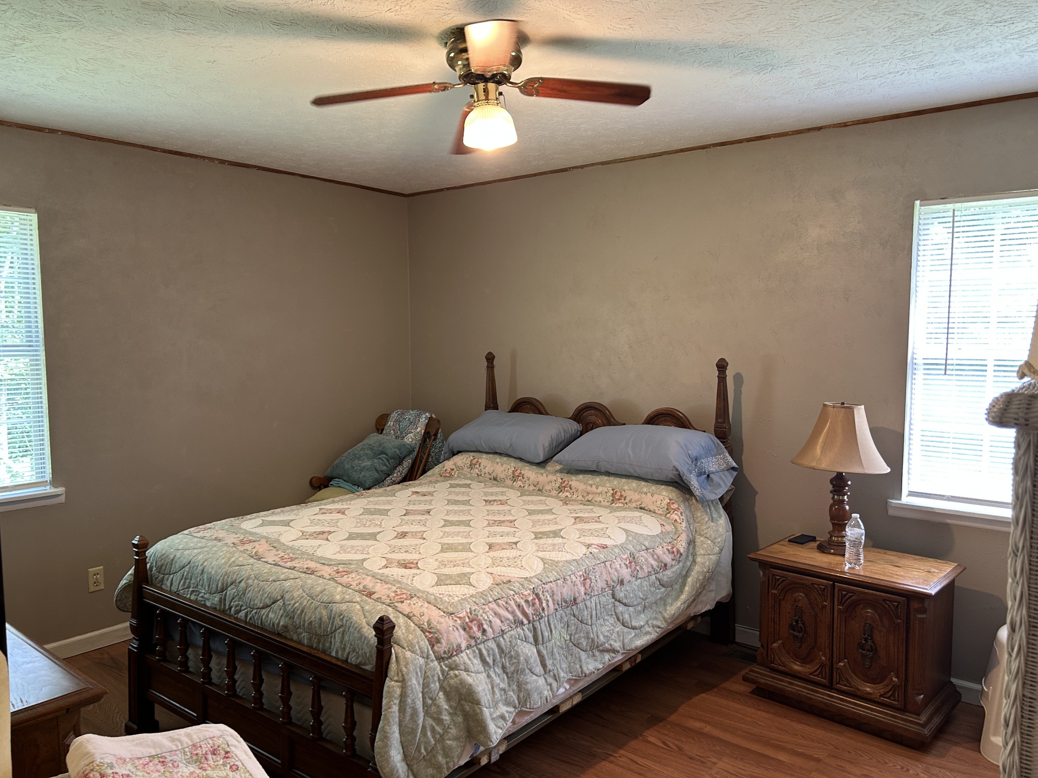 1041 Roysden Road Jamestown, TN 38556 - Photo 16 of 18 a bedroom with a bed a window and dresser
